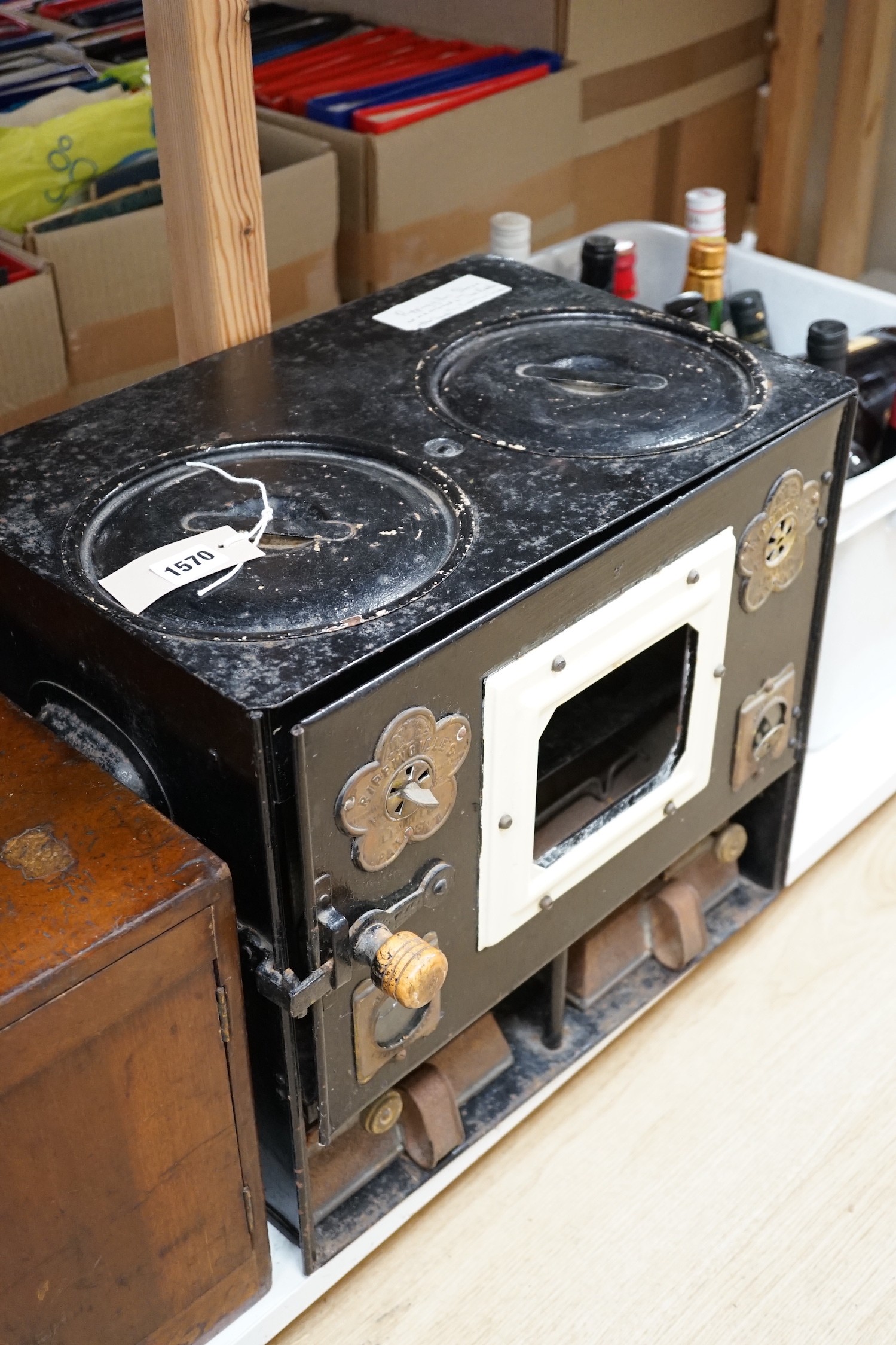 A Rippingilles paraffin stove, 44cms wide x 39cms high